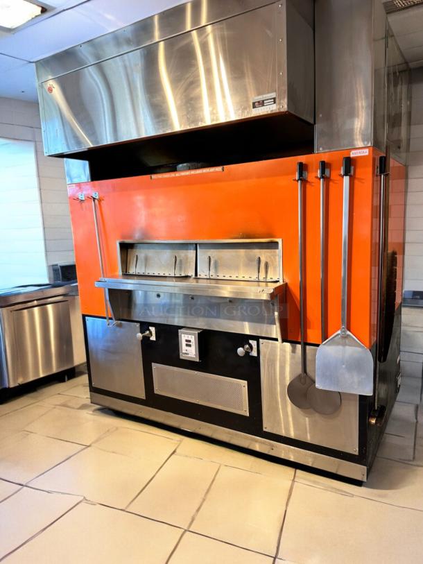 Wood Stone Mt. Adams 9660 pizza oven, natural gas, in outstanding condition. Fully tested and operational, features stainless steel and orange exterior.