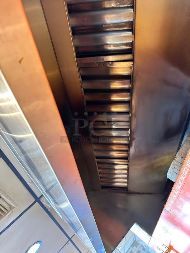 Alt Text: Stainless steel interior of a Wood Stone Mt. Adams 9660 pizza oven in outstanding condition, with visible gas lines.