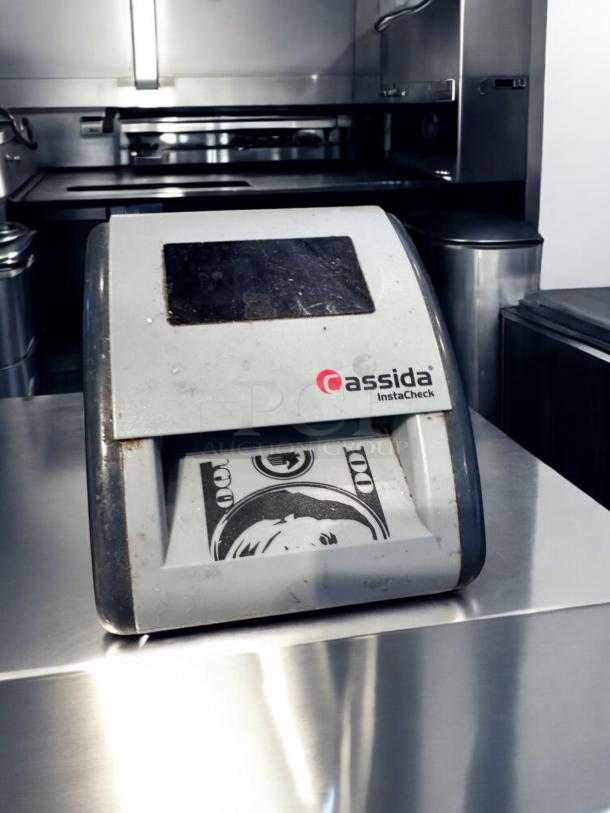 Cassida InstaCheck currency detector, superb condition, fully tested and working, displays a bill.