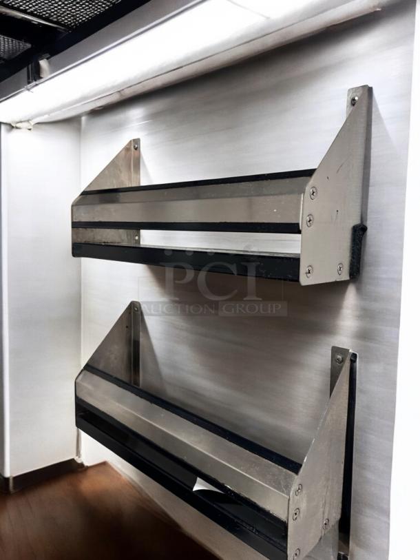 Two stainless steel wall-mounted organizer racks, 19" wide, with black edge trim, in superb condition.