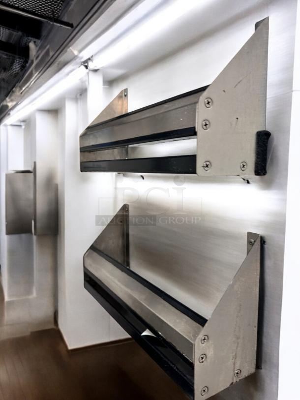 Two stainless steel wall-mounted organizer racks with black edge trim, 19" wide, in superb condition.