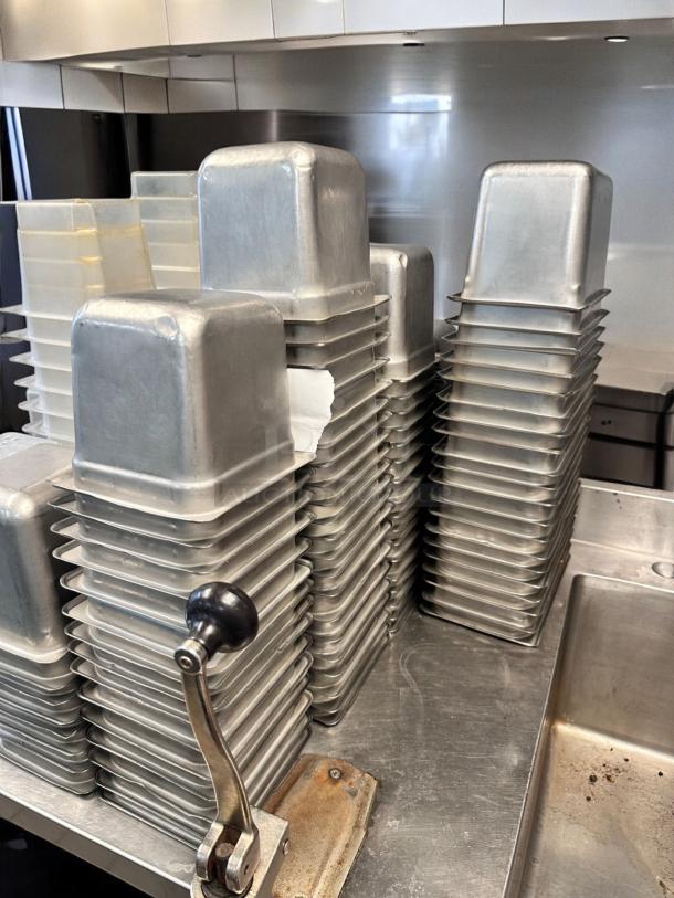 Used commercial aluminum loaf pan set, superb condition, stacked in one lot, ready for service.
