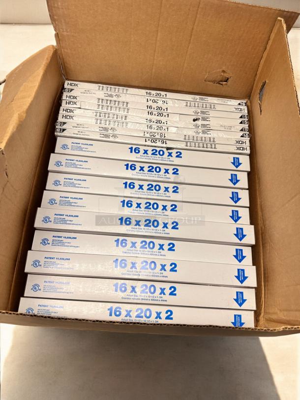 Box of 12 brand new HDX & Merv 8 pleated air filters, dimensions 16" x 20" x 1" and 16" x 20" x 2", sealed packaging.