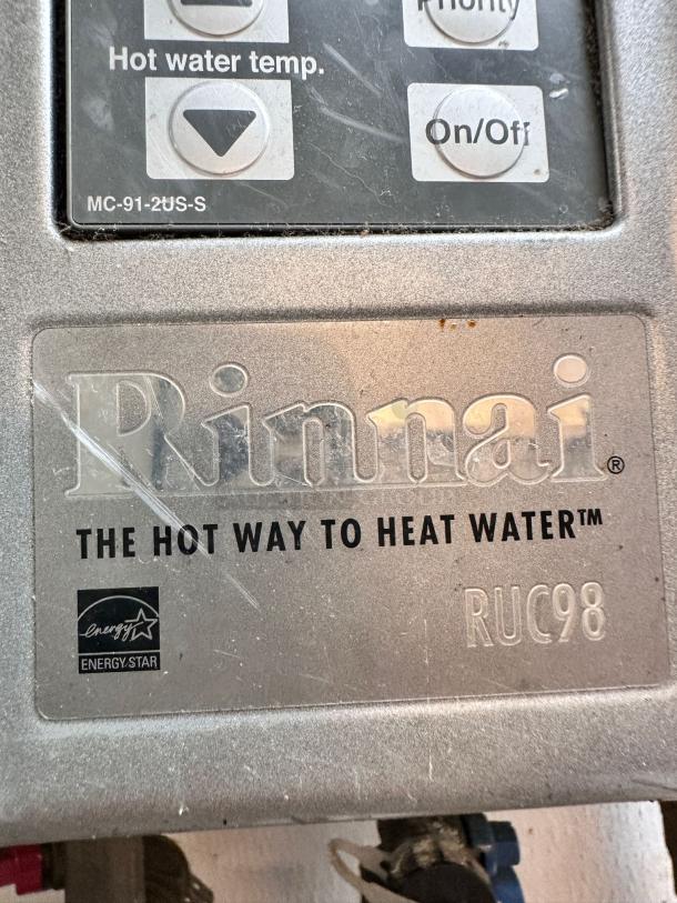Rinnai RUC98iN Tankless Water Heater, superb condition, natural gas, fully tested, Energy Star certified, model RUC98 visible.