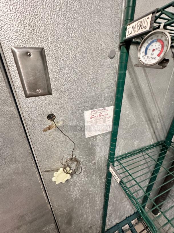 Kolpak Walk-In Cooler/Freezer in outstanding condition, model 4010130519DR25, with a safety sticker, thermometer, and wire shelves visible.