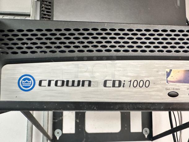 Crown CDi 1000 power amplifier, 2-channel, 500W @ 4 Ohms, great condition, fully tested, model label visible.