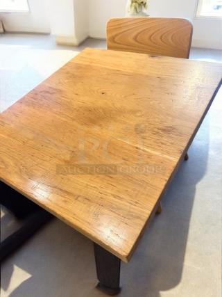Solid wood café table, 27"x24", excellent condition. Durable commercial-grade with solid wood top, steel base. Qty 7 available.