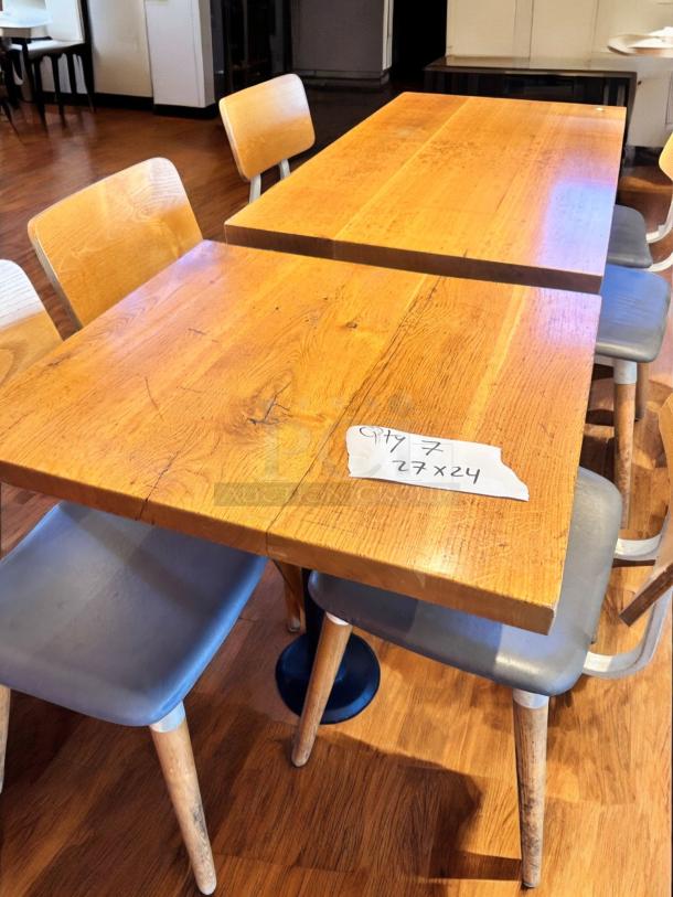 Solid wood café table, 27"x24", excellent condition. Steel base, commercial grade, includes quantity of 7.