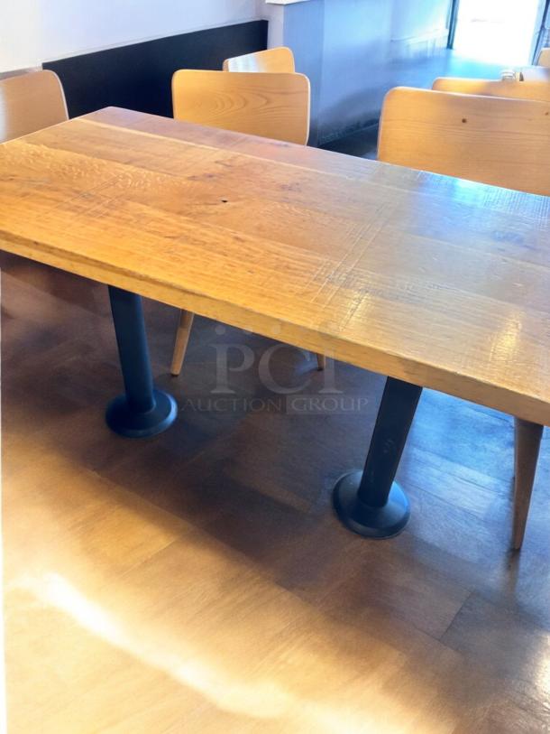 Custom commercial-grade solid wood dining table, 48" x 27". Excellent condition, inspected, dark metal legs.