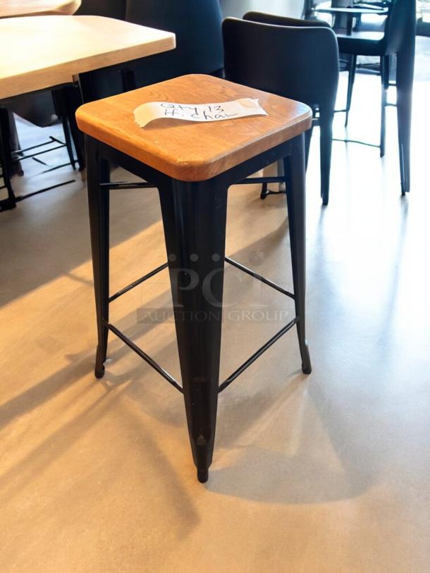 Industrial bar-height stool, solid wood seat, matte black metal frame, excellent condition, quantity 6 available.