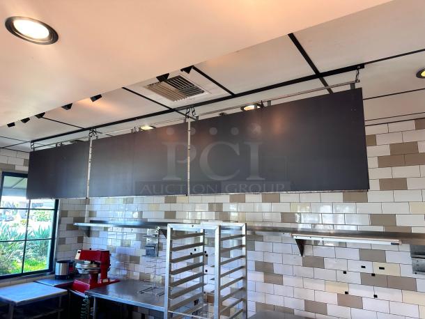 Hanging black menu boards, set of 3, each 48"W x 24"H, top-tier condition, commercial ceiling-hung display.