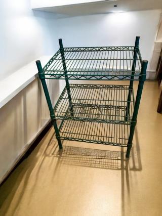 Green epoxy-coated wire shelving rack, 3-tier, heavy-duty, in great condition. Durable and fully inspected for sturdiness.