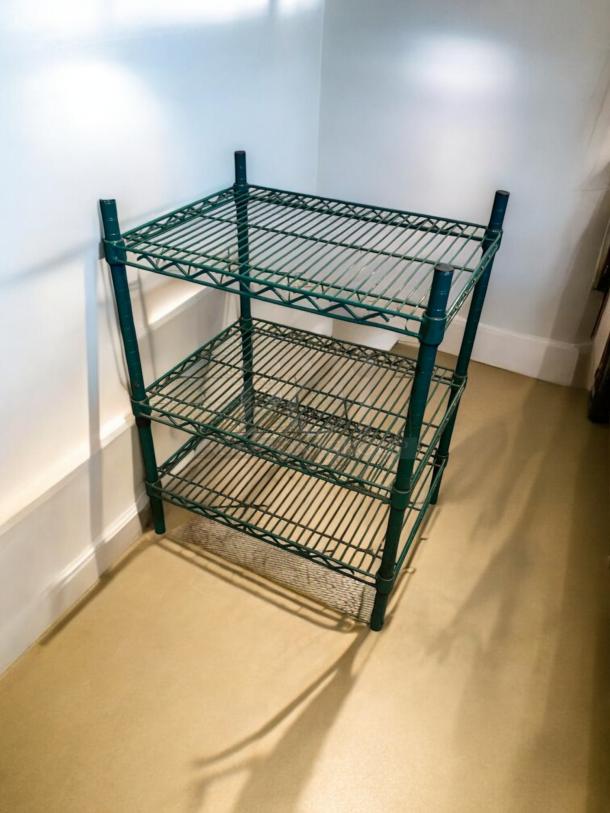 Green epoxy-coated 3-tier wire shelving rack in great condition, heavy-duty, fully inspected, sturdy construction.