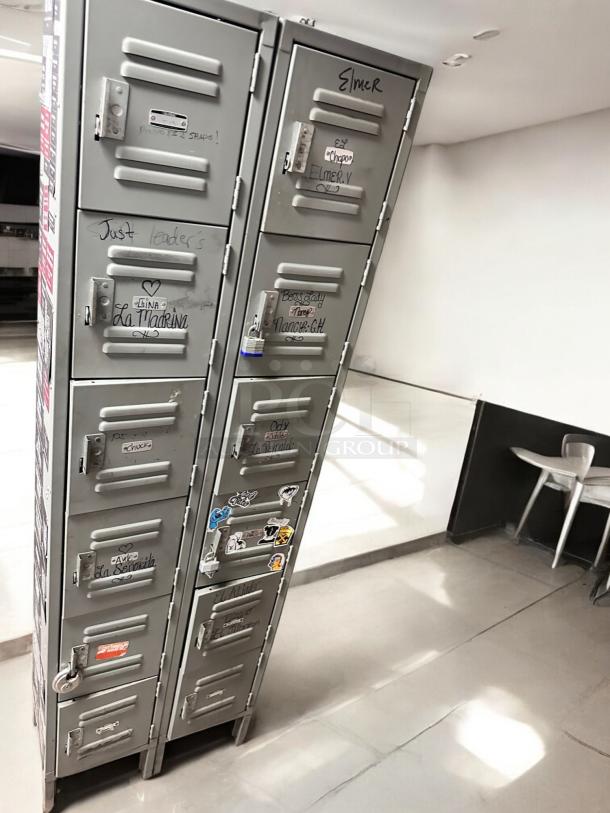 Metal employee locker cabinet with 12 compartments, model 12-Door Vertical Locker, very good condition, labeled doors.