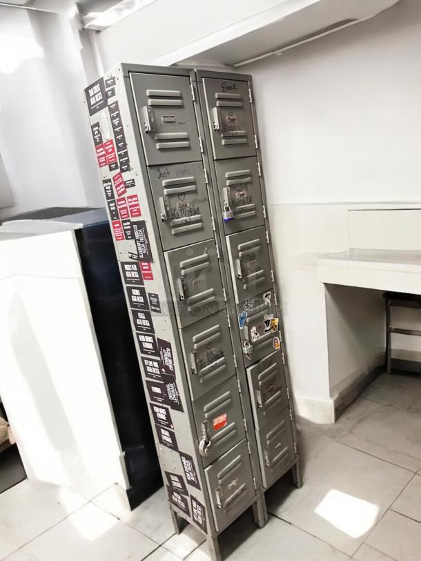 Very good condition metal employee locker cabinet, 12 compartments, 12-door vertical locker model, fully functional, with stickers.