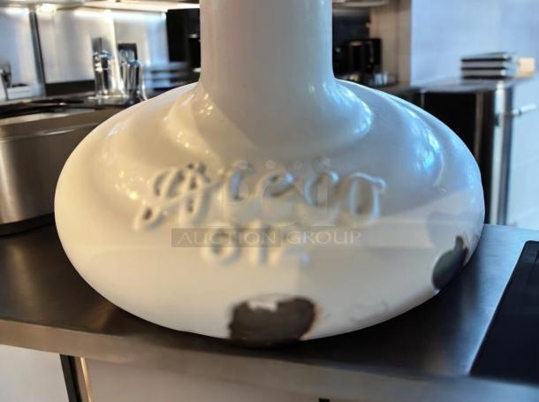 Greco 612 cake display stand with dome lid, white metal base, like-new condition, fully tested, embossed branding visible.