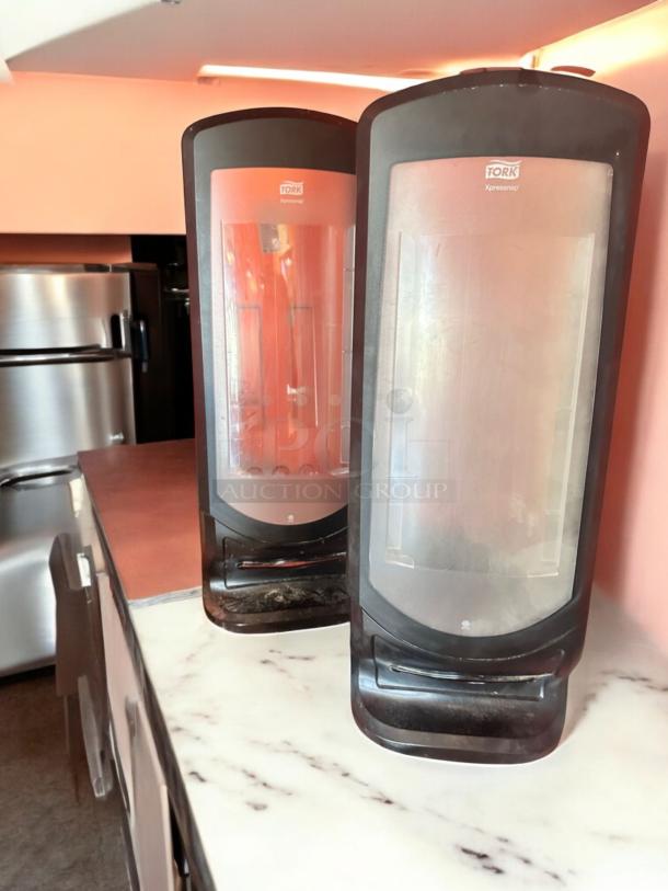 Tork Xpressnap black tabletop napkin dispensers, very good condition, fully tested and functional, model Xpressnap.