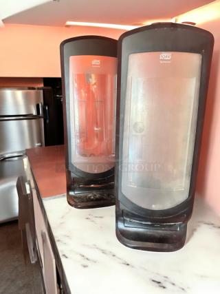 Tork Xpressnap black tabletop napkin dispensers, very good condition, fully tested and functional, model Xpressnap.