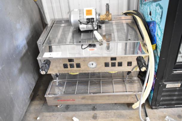 La Marzocco stainless steel 2-group commercial espresso machine with dual steam wands, showing control panel and pressure gauge.
