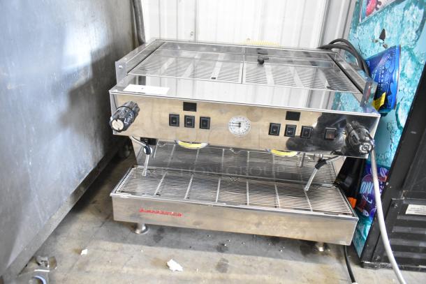 La Marzocco stainless steel 2-group commercial espresso machine with 2 steam wands, polished exterior.