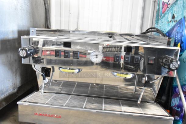 La Marzocco stainless steel 2-group espresso machine, commercial countertop model with dual steam wands, excellent condition.