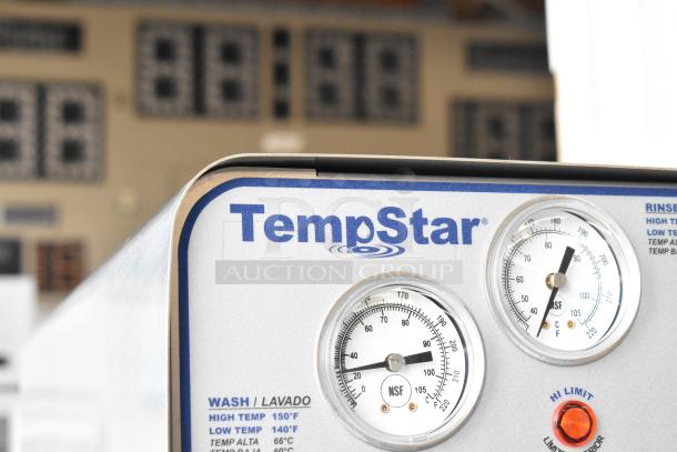 Stainless steel Jackson TempStar high temp commercial dishwasher, 2024 model, with visible gauges and NSF certification.
