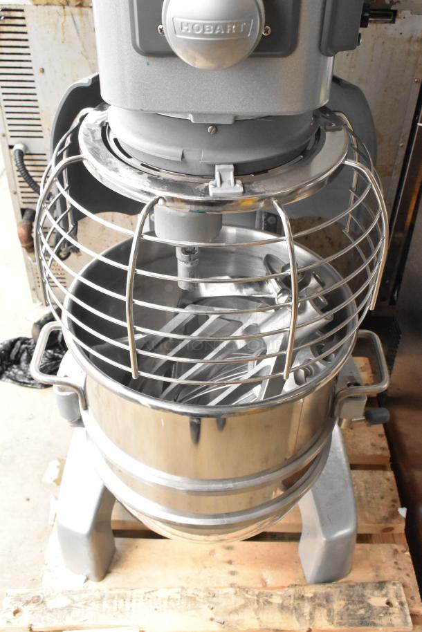 Hobart Legacy HL400 commercial mixer with 40-quart stainless steel bowl, bowl guard, paddle, whisk, dough hook. 200-240 volts.