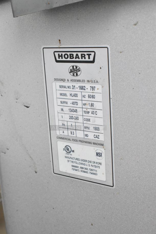 Hobart Legacy HL400 commercial 40qt mixer label with model details, voltage 200-240V, phase 1, RPM 1800.