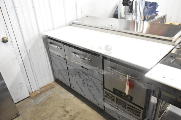 Continental CPA60 stainless steel pizza prep table, new with scratch and dent, on commercial casters. 115V, 1 Phase.
