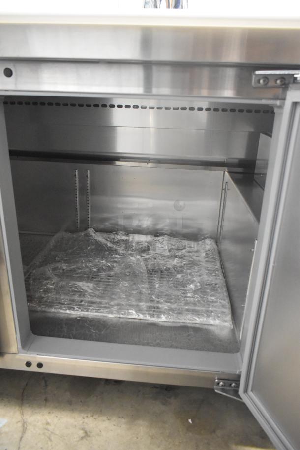 Brand new 2020 Continental CPA60 stainless steel pizza prep table, scratch and dent, on casters, 115V, 1 phase.