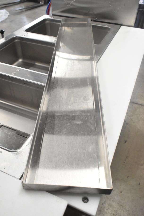 Brand new 2023 Eagle SHT3-120 stainless steel 3-bay steam table, 120V, with metal under shelf. Scratch and dent condition.