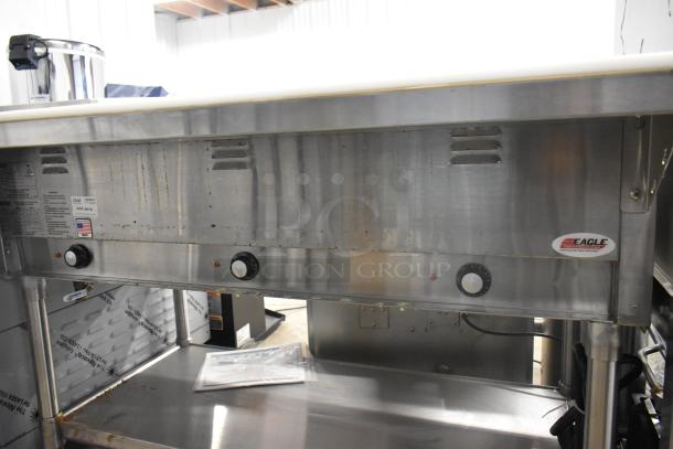 Brand new 2023 Eagle SHT3-120 stainless steel 3-bay steam table, electric, 120 volts, metal under shelf, minor scratches.