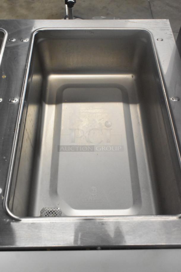 BRAND NEW 2023 Eagle SHT3-120 stainless steel 3-bay steam table with metal under shelf, 120V, 1 phase, scratch and dent condition.
