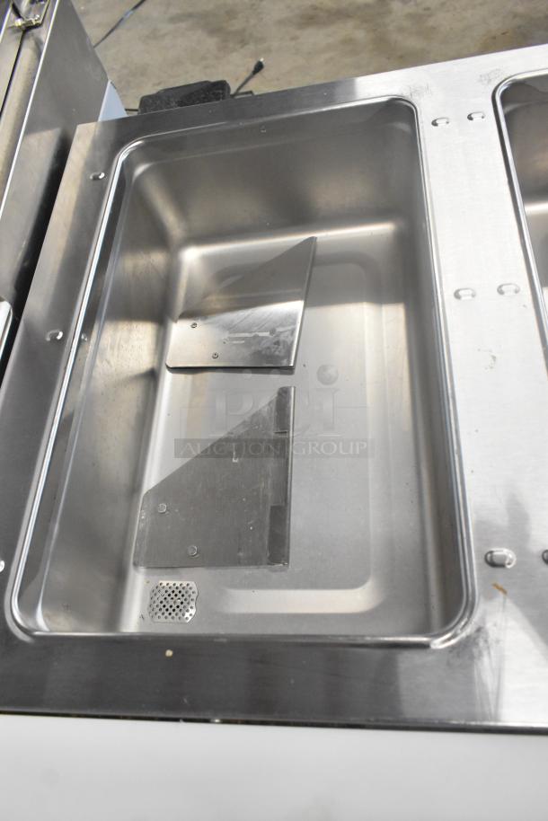 2023 Eagle SHT3-120 stainless steel electric steam table, 3 bays, metal under shelf, 120V, 1 phase, scratch and dent condition.