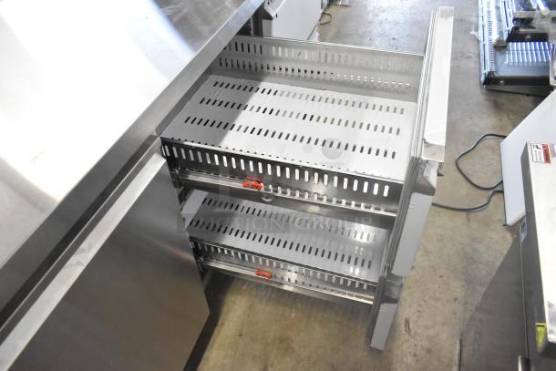 Avantco 178SSWD3R stainless steel worktop refrigerator, commercial grade, extra deep, with 3 1/2" backsplash, on casters.
