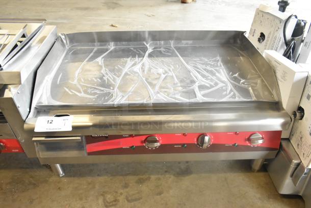 Brand new Avantco 177EG30N stainless steel 30" electric countertop griddle. Scratch and dent condition, 208/240 volts, 1 phase.