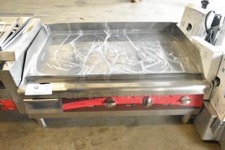 Brand new Avantco 177EG30N stainless steel 30" electric countertop griddle. Scratch and dent condition, 208/240 volts, 1 phase.