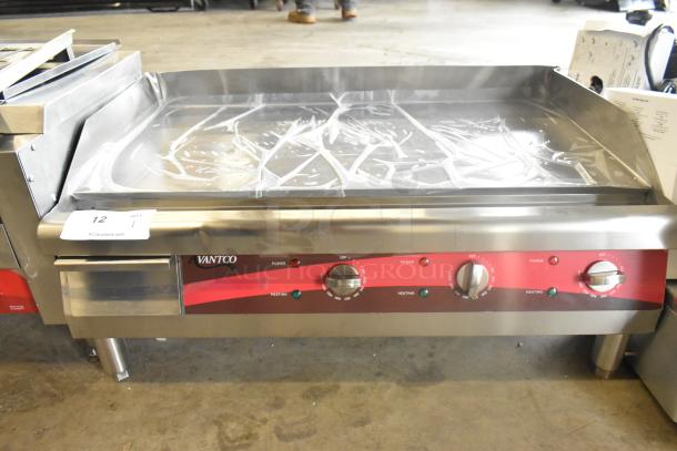 Brand new Avantco 177EG30N 30" stainless steel electric countertop griddle, 208/240V, 1 phase, with minor scratches.
