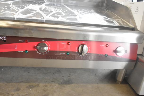 Brand new Avantco 177EG30N stainless steel 30" electric countertop griddle, features scratches and dents, 208/240V, 1 Phase.