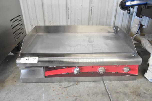 Brand new Avantco 177EG30N stainless steel 30" electric griddle; countertop model with scratch and dent, 208/240V.