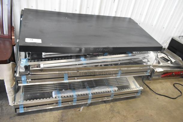 "ServIt 423OAM138D 48\" slanted 2-shelf heated display, scratch, and dent damage visible, 120V, 1 phase."