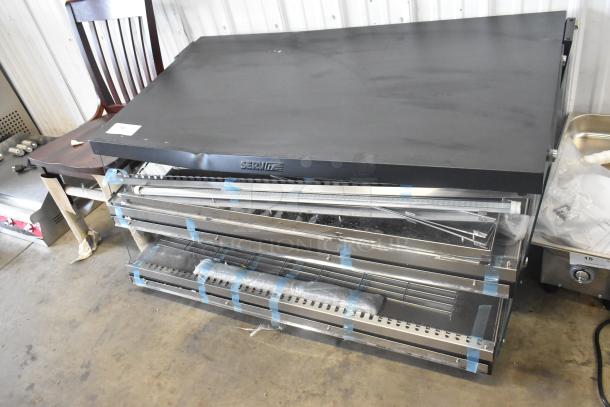 BRAND NEW ServIt 423OAM138D 48" slanted 2-shelf heated display merchandiser with visible scratch and dent damage. 120V, 1 phase.
