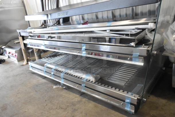 Brand new ServIt 423OAM138D 48" slanted 2-shelf heated display merchandiser. Scratch and dent. 120V, 1 phase, visible damage.