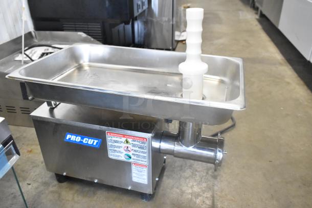 BRAND NEW Pro-Cut KG-12-SS #12 Stainless Steel Electric Meat Grinder, 120V, 1 Phase, with visible label and warning stickers.