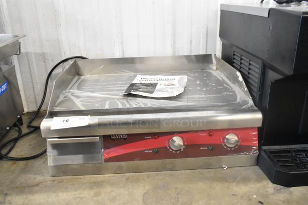 Brand new Avantco 177EG24N stainless steel 24" electric countertop griddle. Features two control knobs. 208/240V, 1 Phase.