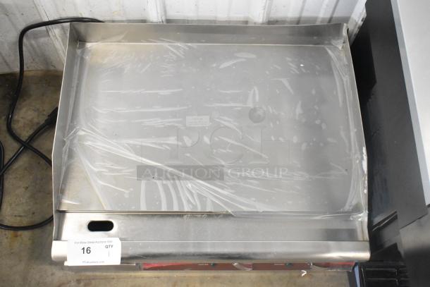 Brand new Avantco 177EG24N 24" stainless steel countertop griddle, electric, 208/240V, 1 phase, with minor scratches.