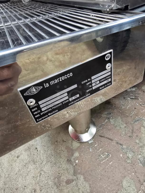 2022 La Marzocco 2AVHW Linea Stainless Steel 2 Group Espresso Machine plaque with model, volts, and manufacturing details.