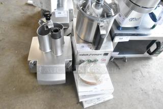 Brand new Robot Coupe R 702 food processor with 1/8" slicing disc, dice cleaning kit, and grating disc. 208-240V, 3 Phase.