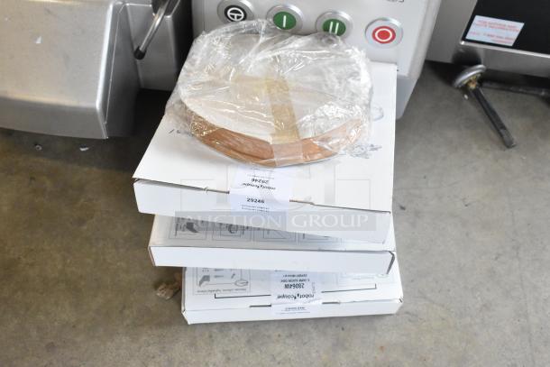 Brand new Robot Coupe R 702 food processor, includes 28064W slicing disc, 29246 cleaning kit, and 28058 grating disc.