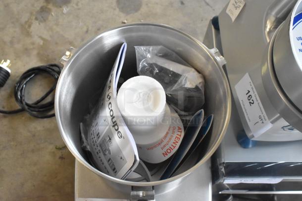 Brand new Robot Coupe R 702 food processor, includes 1/8" slicing disc, dice cleaning kit, and 1/8" grating disc. 3-phase.